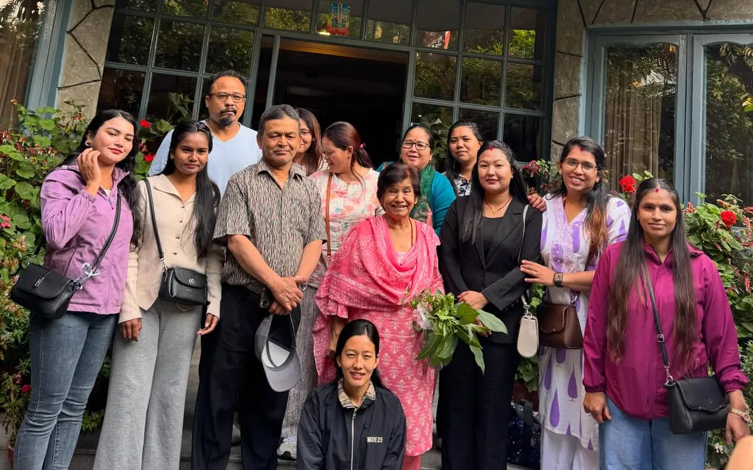 Family and guests at the entrance at The Silver Oaks Inn, Pokhara