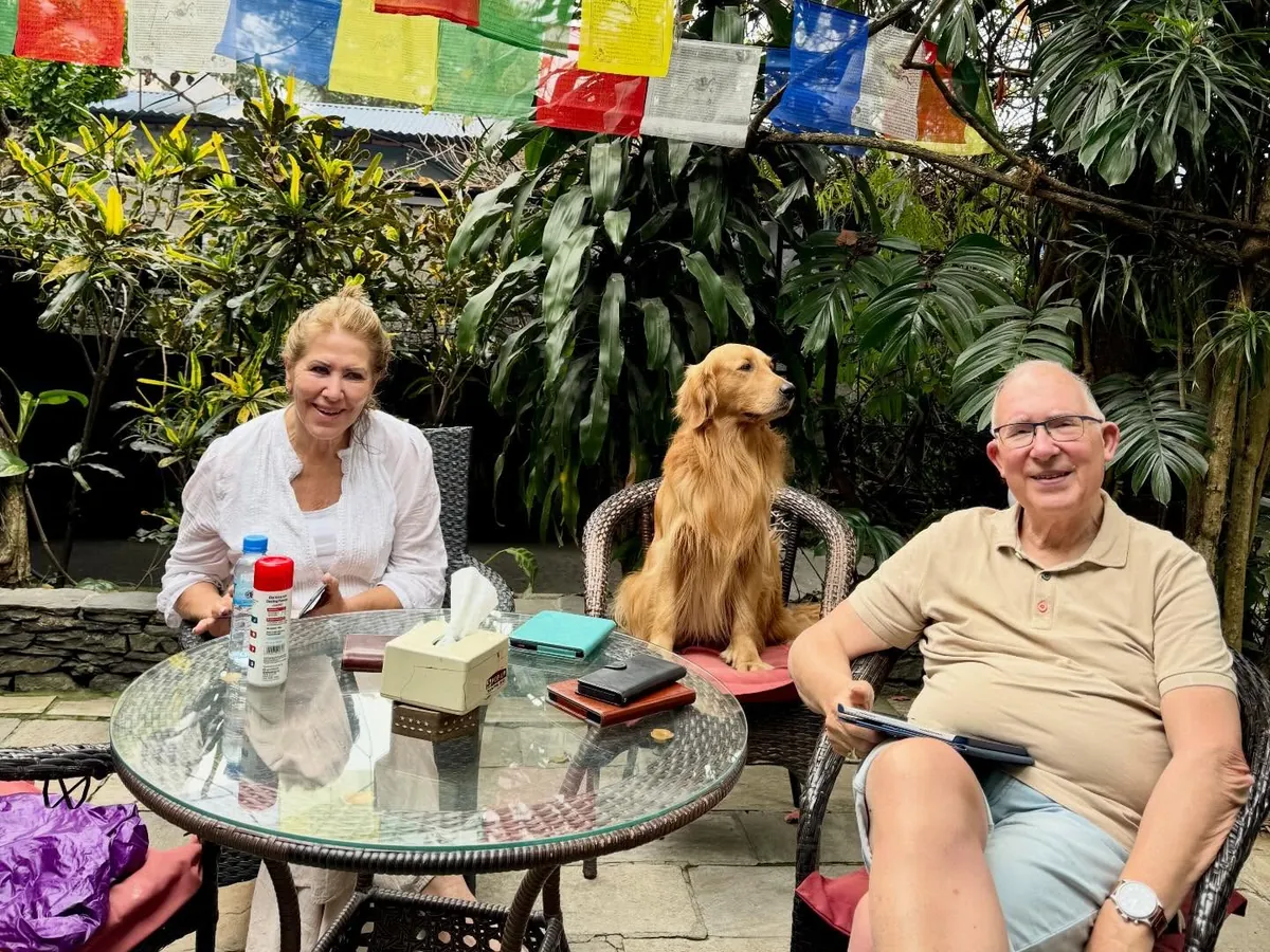 Coffee in the garden with Puku at The Silver Oaks Inn, Pokhara
