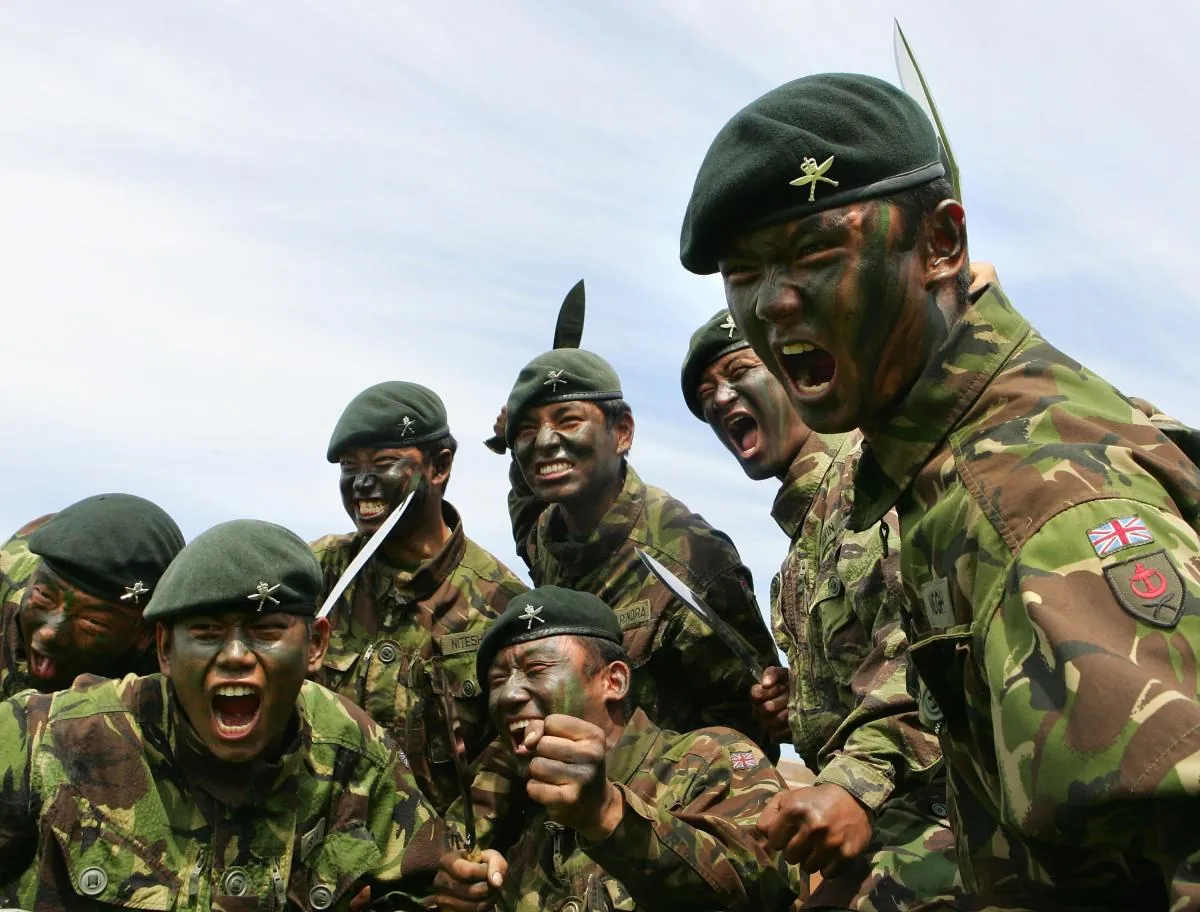Gurkha soldiers in camouflage and berets cheering together
