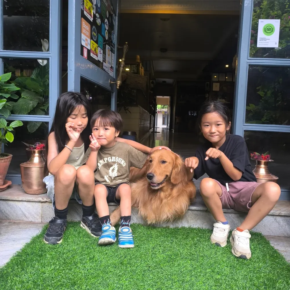 Puku with young guests at The Silver Oaks Inn, Pokhara