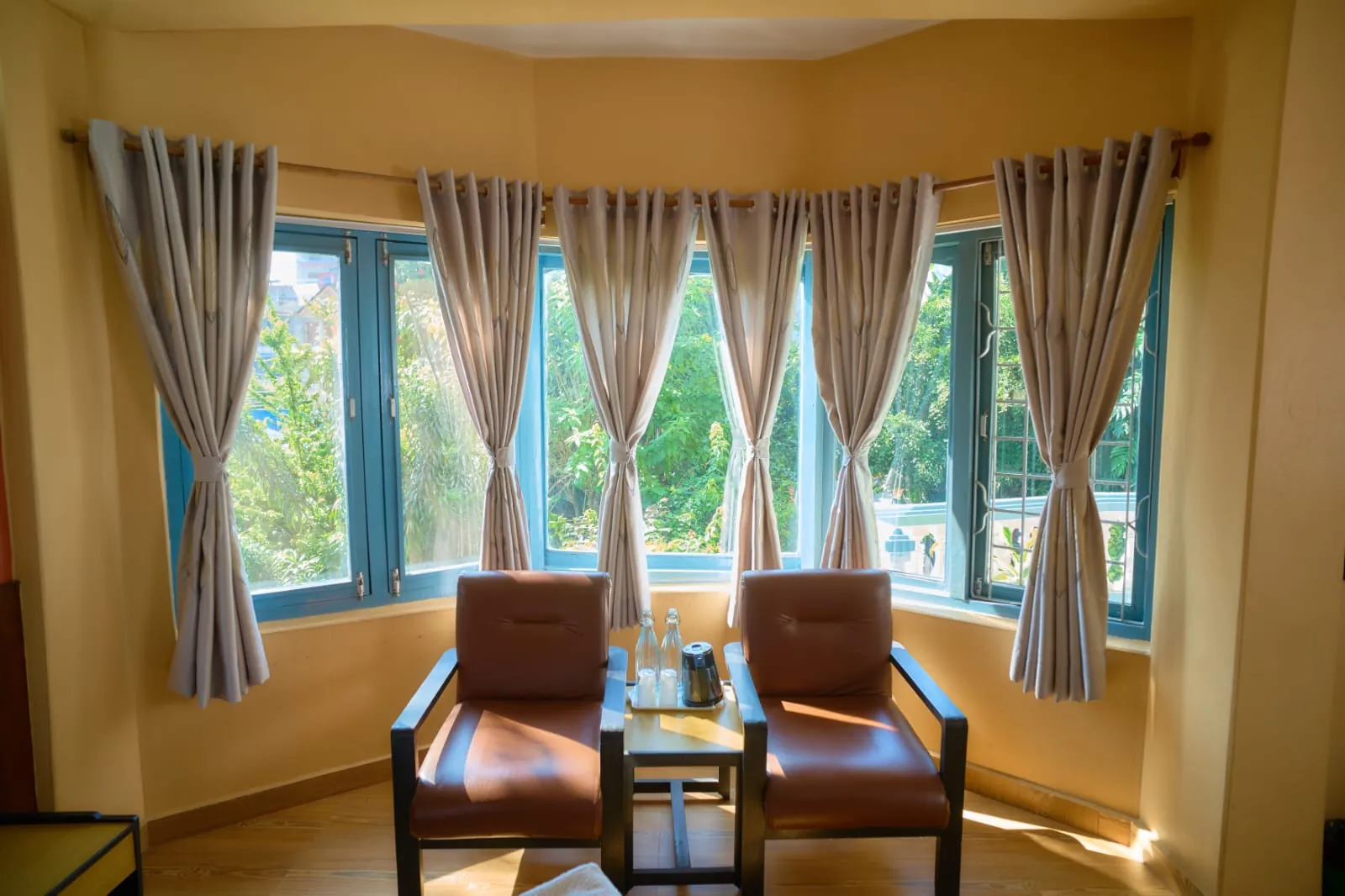 Window seats in a deluxe room at The Silver Oaks Inn, Pokhara